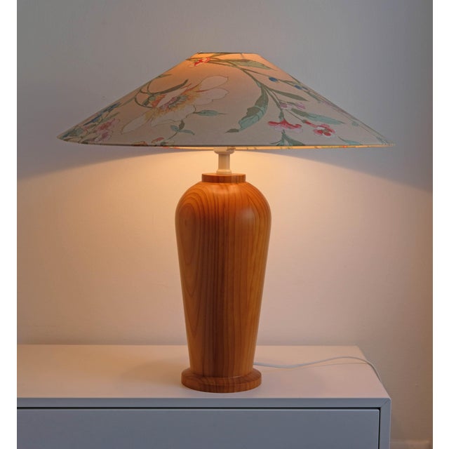A rare and highly collectible ikea vintage lamp from the early 1990s, pairing the sculptural sirocko solid‑wood base with...