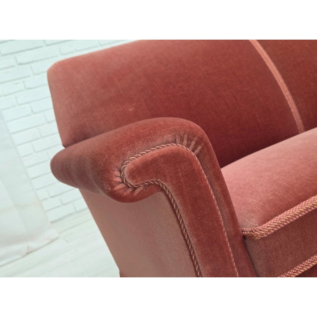1970s, Danish 3-seater sofa. Salmon pink furniture velour, beech wood legs, springs in the seat. Original very good...