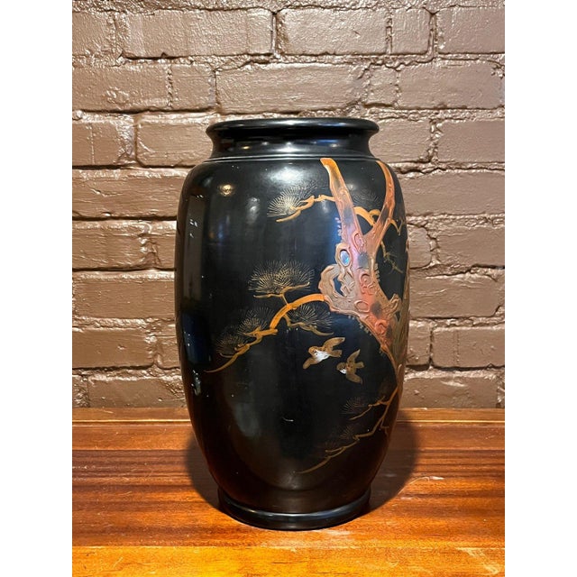 Antique Japanese high-relief lacquer baluster vase measuring 16 inches tall with an 8-inch mouth diameter. Features a...
