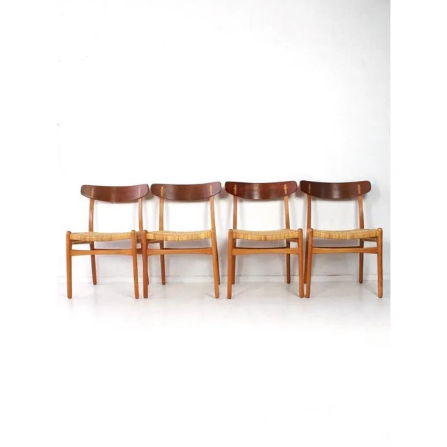 Rare set of 4 dining chairs early editions model CH23 designed by Hans J Wegner for Carl Hansen Son, Denmark 1950's. The...