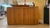 Striking and Sophisticated Mid-Century Modern Pencil Reed Rattan Credenza with Demilune Ends. This handsome sideboard...