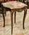 Elegant French style side table featuring a luxurious multicolor marble top beautifully complemented by ornate bronze and...