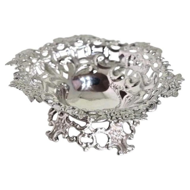 A Victorian sterling silver trinket or bonbon dish by Carrington & Co., hallmarked London 1893. Of near-circular form, the...
