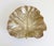 A gold anodized aluminum alloy sea grape leaf decorative dish, bowl, or centerpiece, handcrafted by Virginia...
