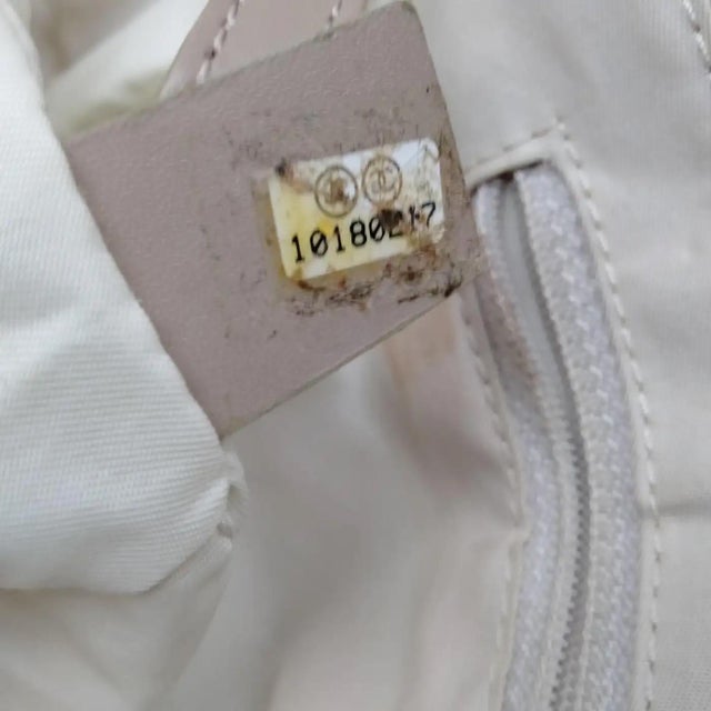 A 2003 Chanel New Travel Line Beige Nylon and Brown Leather Tote Bag For Sale - Image 14 of 15