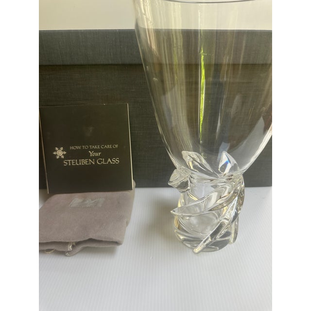 The STEUBEN Vintage 1958 Donald Pollard MCM Art Glass "WHIRLPOOL" Vase # 8087-ST is an exquisite piece of vintage art...