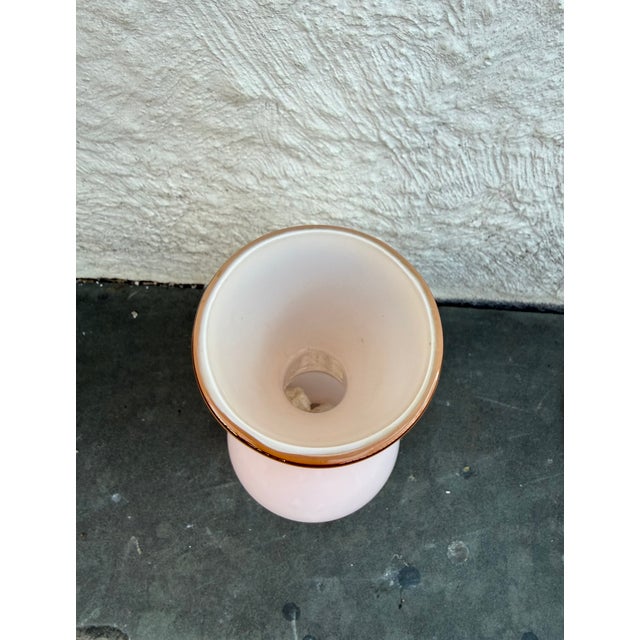 Long neck genie bottle shape glass base comprising of pink over white glass. Possibly manufactured in Empoli, Italy. This...