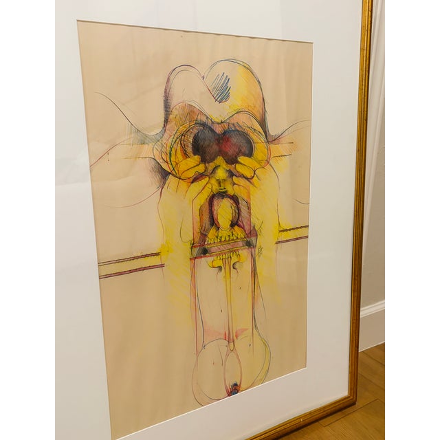 A striking original surrealist mixed media drawing on paper, signed and dated 1970, presented in a handsome vintage gilt...