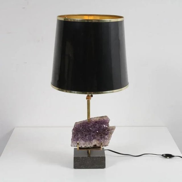 A rare table lamp with beautiful Amethyst core, in the style of Willy Daro, manufactured in Belgium around 1970. The lamp...
