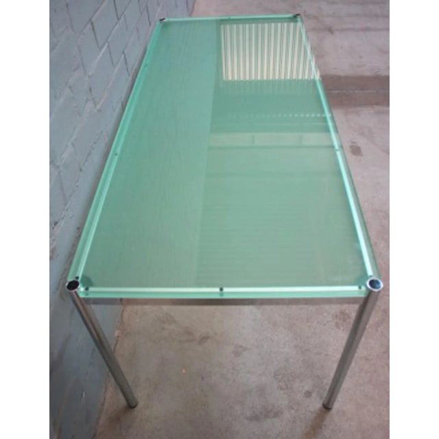 This minimalist table was designed by Fritz Haller and Paul Schärer for USM Haller in Switzerland. It is made from chromed...