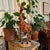 Elevate your home decor with the exquisite Kenyan Wooden Carved Giraffe Figurine, a stunning representation of...