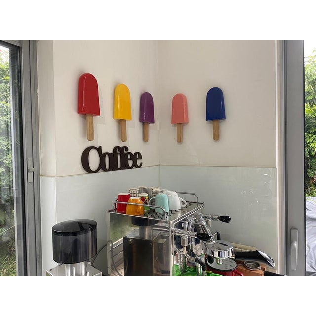 Add a unique sense of individuality into your space with this incredibly stylish Yellow ice pop sculpture. Handcrafted by...