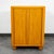 Stylish tambour door utility cabinet by Heywood Wakefield. This unique compact design features an adjustable shelf within....