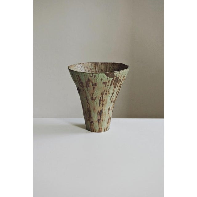 In Bloom V Ceramic Vase by Antonia Maria One of a Kind. Dimensions: Ø 26 x H 27 cm. Materials: Ceramic, grey clay,...