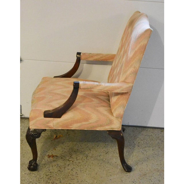 High end hickory chair company chippendale open arm chair featuring scrolled arm ends with shaped back shaped seat resting...