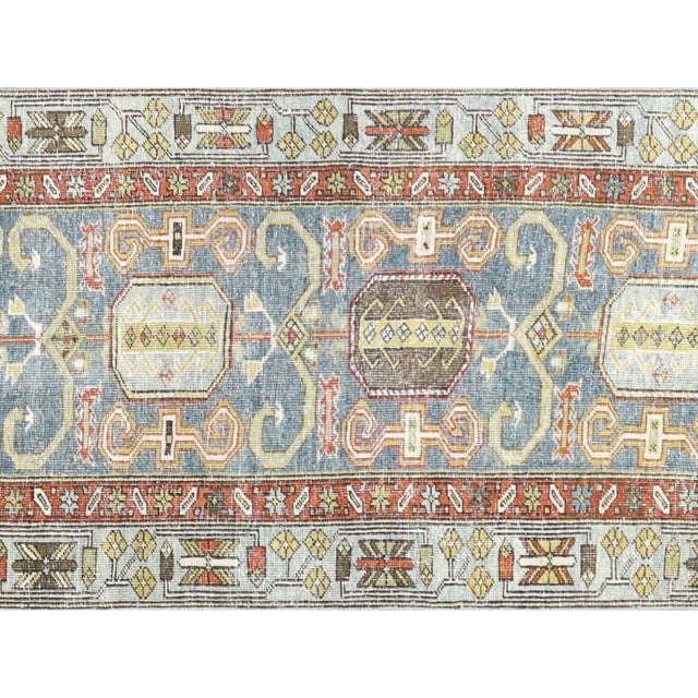 Experience the timeless beauty of a Semi Antique Persian Melayer Runner. Hand-woven with exquisite detail and traditional...