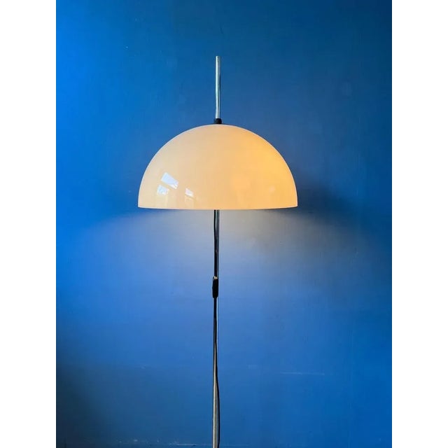 Classic vintage mushroom floor lamp by Dijkstra with white acrylic glass shade. The shade can be moved up and down the...