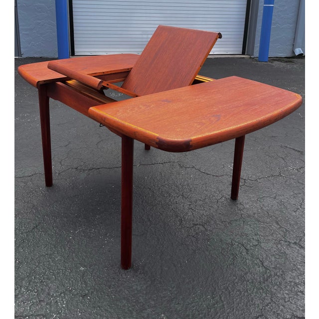 Mid Century Modern Danish Teak Extendable Dining Table With Butterfly Self-Storing Leaf For Sale - Image 4 of 12