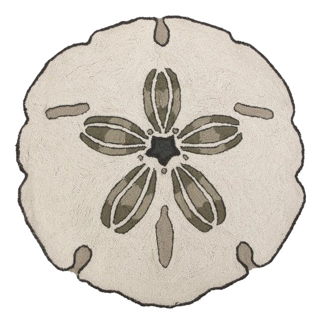 100% wool hooked accent rug. Door mat/entryway decoration rug in the shape of a sand dollar. 36" x 36" round. Care...