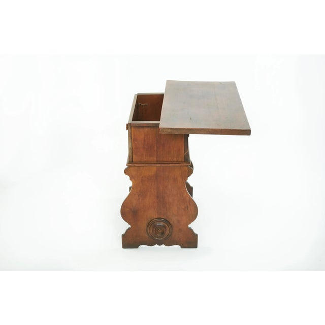 19th Century renaissance revival style walnut writing table / desk. The writing desk is in good condition with appropriate...