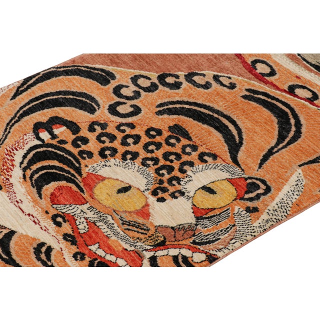 Hand-knotted in wool, this 3x4 modern tiger pictorial rug is a bold addition to the Rug & Kilim Tiger rugs line of their...