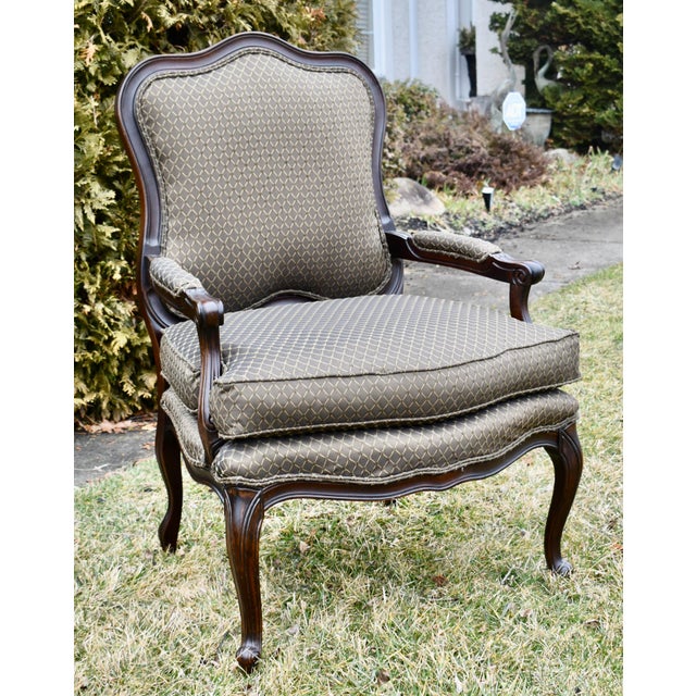 Vintage (1980's) Arm Chair has a Traditional Style. Made by Fairfield Furniture. Wood Frame with Bottom Loose Pillow. The...