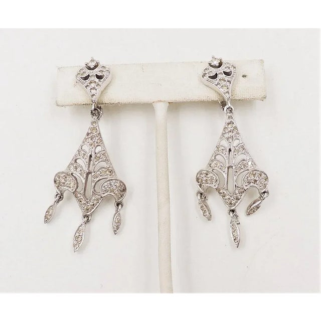 1960s Vintage 1960s Signed Polcini Rhodium Plated Rhinestone Chandelier Clip Earrings - 2 Pieces For Sale - Image 5 of 8