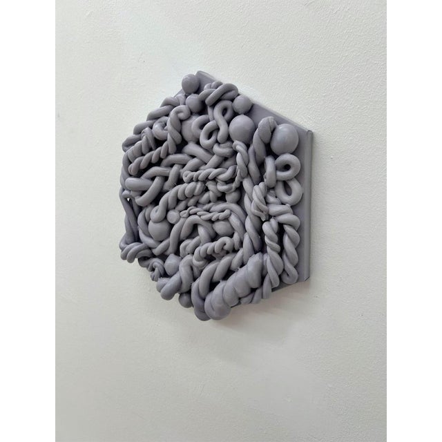 "Lilac Gray" is a compelling sculptural piece from Elizabeth Art Candy’s Fake Marshmallow series, where intricate textures...