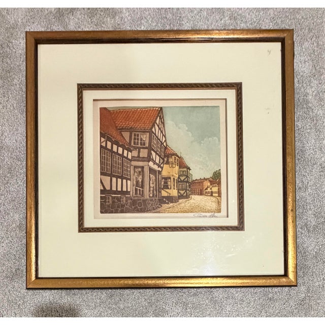 Otto Holm, Sønderborg Street Scene. Hand-colored etching on paper depicting a picturesque cobblestone street in...