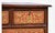 Ornate 19th C Chinese wooden chest has hand-carved floral and scrollwork panels with a red and gold gilt finish. This...