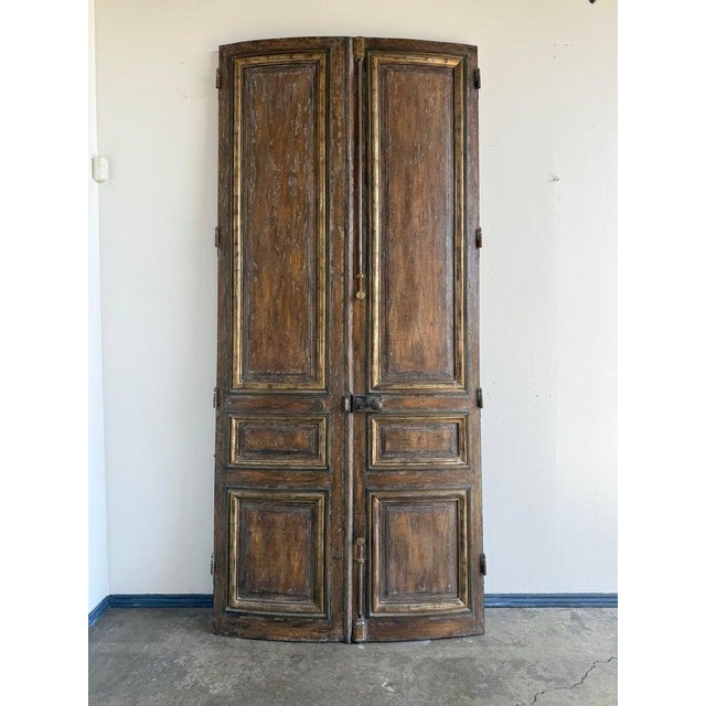 These European antique carved doors are an elegant pair, showcasing classic craftsmanship and historical charm. We...