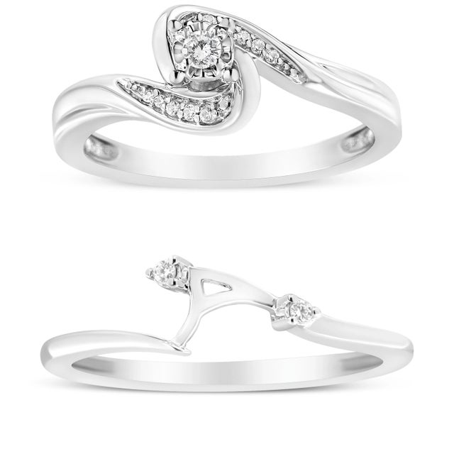 Indulge in the mesmerizing allure of this .925 Sterling Silver Bridal Set Ring and Band. Crafted with utmost precision,...