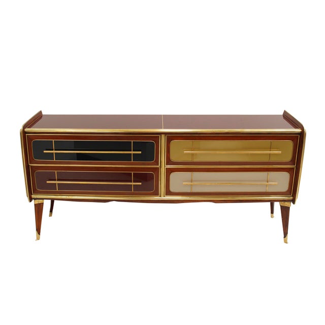 Stunning mid-century Italian sideboard with a striking design from the 1950s. This exquisite piece features a solid wood...