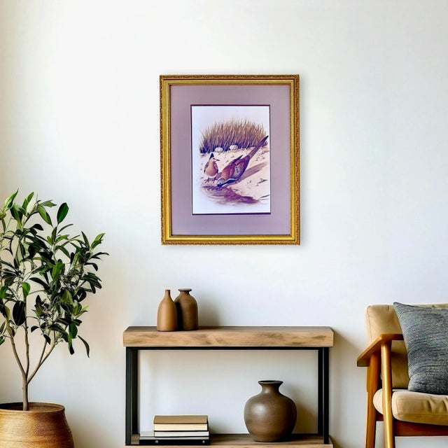 This original limited-edition print is by the renowned Persian artist Mansour Khaleghi (1939–1999). It features a pair of...