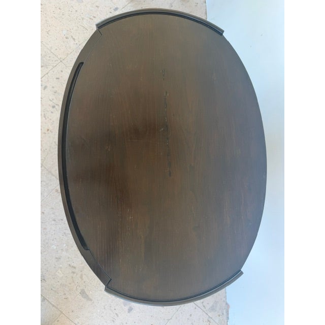 This console works great in a living room or a bedroom as it supports a table lamp, has a pull-out tray table and a pull-...