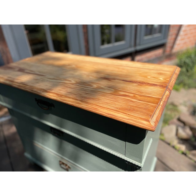 This charming antique chest of drawers has been repainted by us; the surface has been sanded and oiled. The interior has...