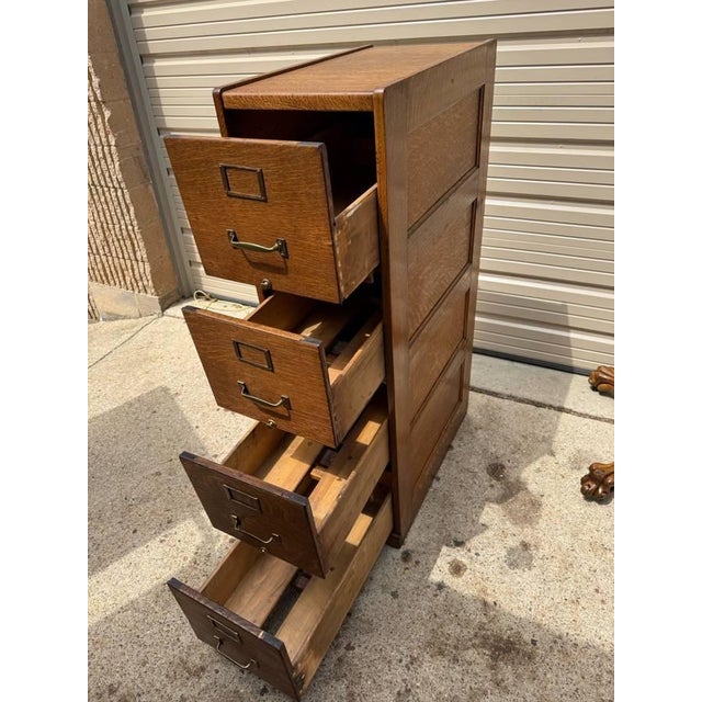 Antique Macey style Four Drawer Oak File Cabinet An antique American turn of early 20th century Vertical Four Drawer Oak...