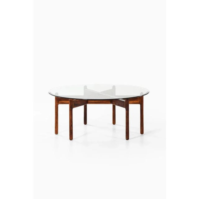 Very rare coffee table model Genius designed by Illum Wikkelsø. Produced by CFC Silkeborg in Denmark. This piece is...