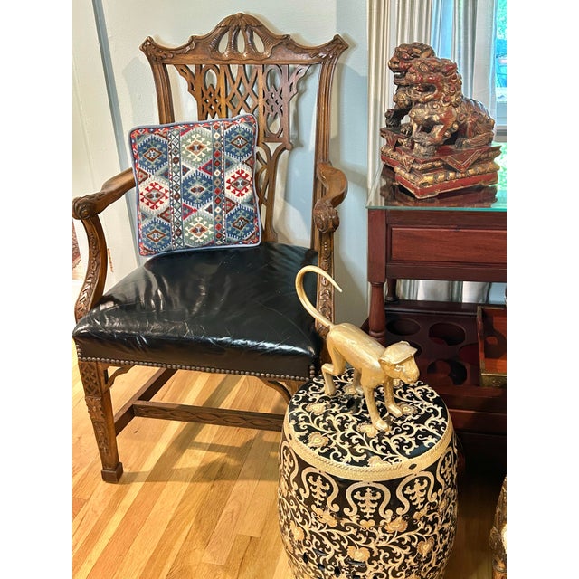 This Chinese Chippendale armchairs is by Century Furniture and was built to last for generations. The yolk is pagoda style...