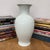 "About This Piece About This Piece Bring home a timeless expression of elegance with this white glazed ceramic vase,...