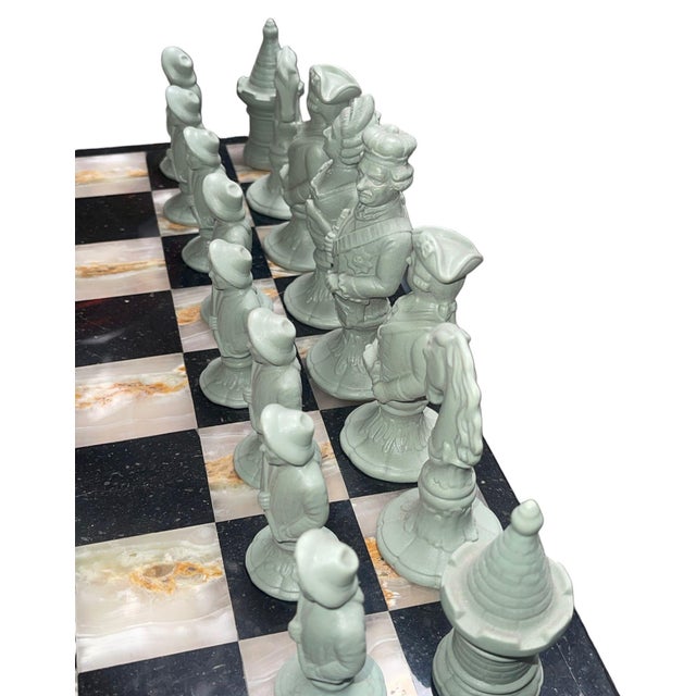 An exceptional and rare vintage Fürstenberg biscuit porcelain chess set, dating circa 1947 and presented on a polished...