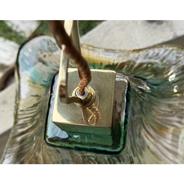 Elegant Italian Murano glass pendant light from the 1970s, executed in the distinctive style associated with Mazzega. The...