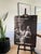 Own a piece of photography history with this iconic exhibition poster featuring Nan Goldin’s "Bea, Ivy, and Susan in front...