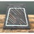 This vintage stoneware tile is cast in a distinctive trapezoidal form, its tapered sides giving the piece an...