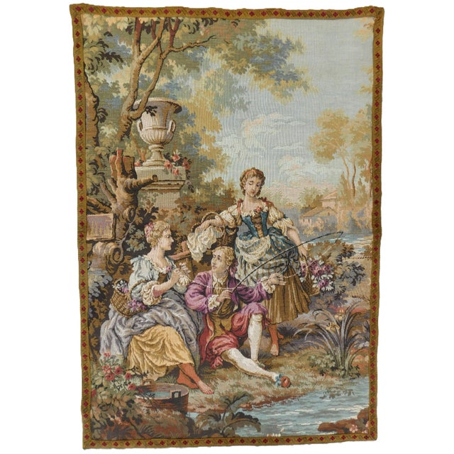French Goblin tapestry depicting a country scene. Noble man accompanied by two women fishing at the river, surrounded by...
