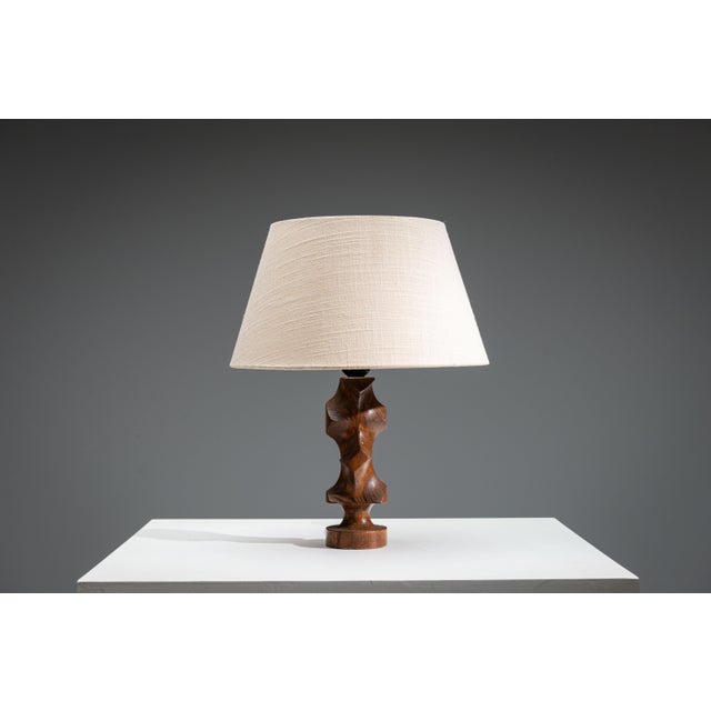 This vintage Brutalist table lamp is a striking example of sculptural design, where function meets raw artistic...