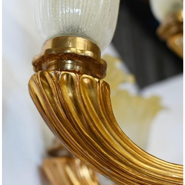 Incredible pair of large Empire style floor lamps or torchieres Hand crafted from gilt and faux malachite The faux...