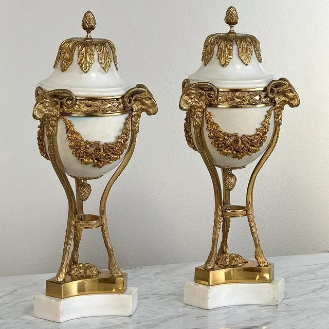 Pair Antique Carrara Marble and Bronze D'Or Cassolettes ~ Mantel Urns were designed for impressive opulence, symmetry, and...