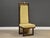 A solid mahogany and gold accent dining chair or lounge chair with original yellow fabric. Circa 1980’s. Seat height is...