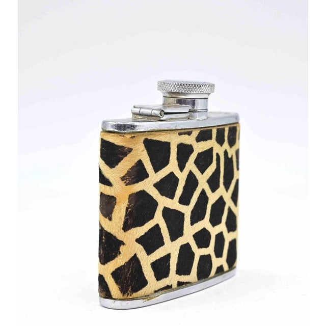 Vintage Liquor Flask realized in England in 1970s. Metal and fabric with leopard motifs. Excellent condition.